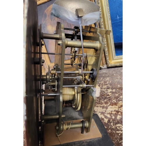 319 - A 19th Century clock movement, the dial painted, Hewitt & Barnes, Gainsborough, with associated maho... 