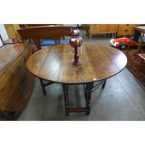 8 - A George III oak gateleg dining table