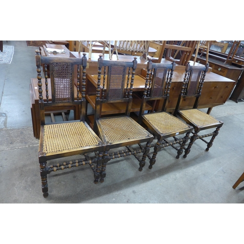 119 - A set of four early 20th Century beech bergere dining chairs