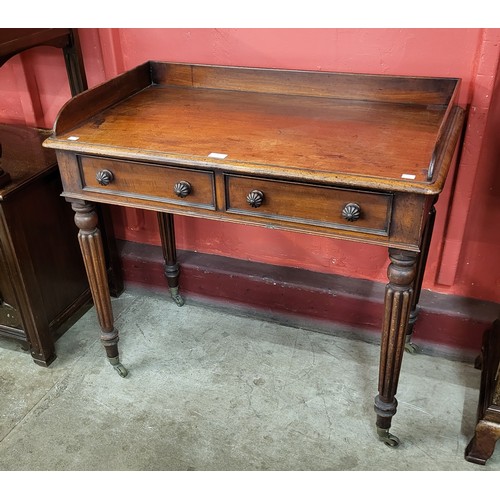 1 - A George IV mahogany two drawer writing table, manner of Gillows, Lancaster, 83cms h, 91cms w, 51cms... 