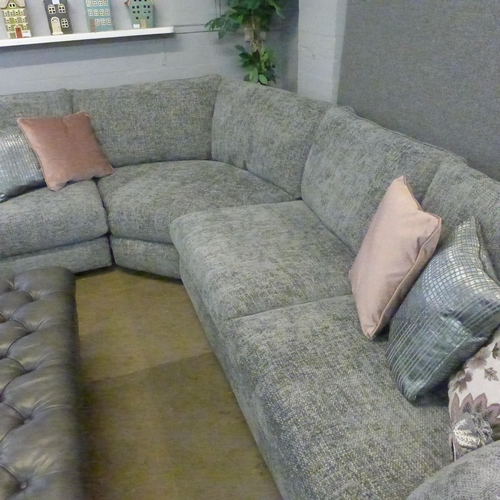 1312 - A charcoal upholstered corner sofa