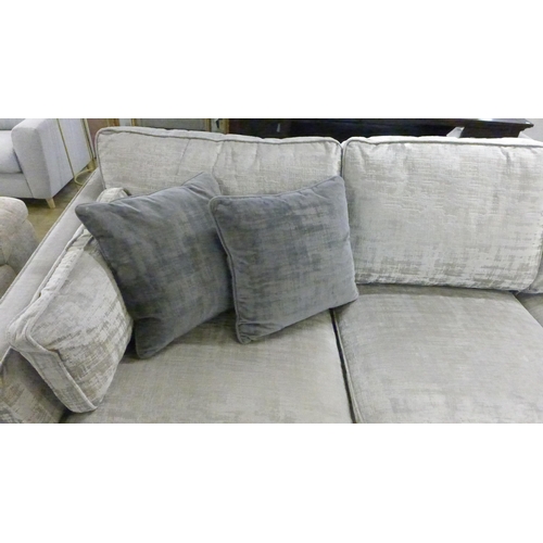 1377 - A silver and bronze velvet five seater sofa