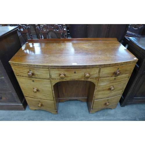 103 - A George IV mahogany bow front sideboard