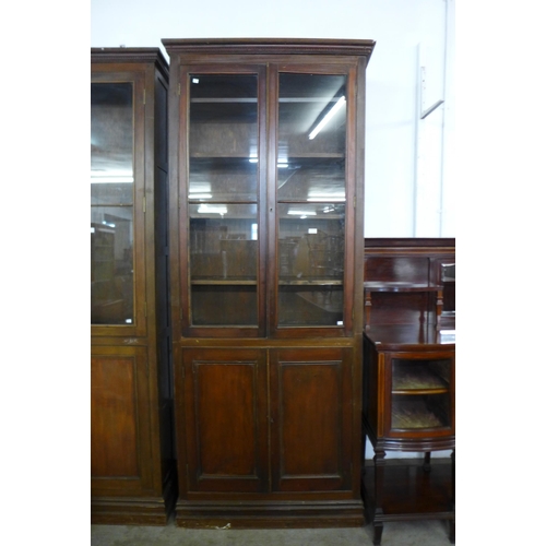 110 - A large early 20th Century mahogany bookcase, 250cms h, 103cms w, 28cms d