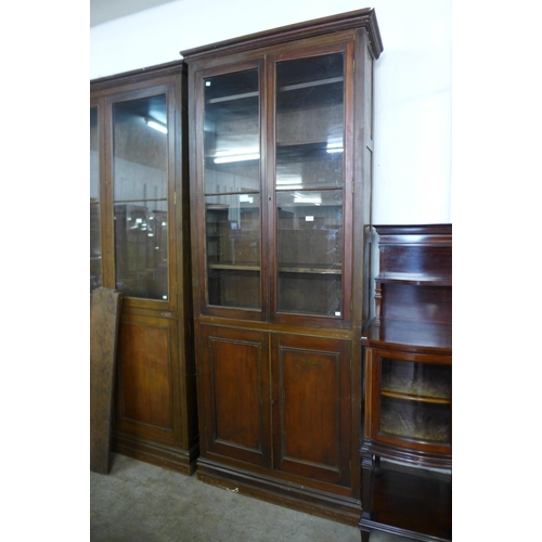 110 - A large early 20th Century mahogany bookcase, 250cms h, 103cms w, 28cms d