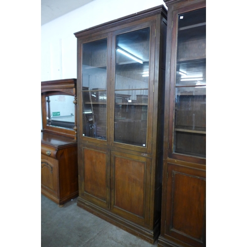 111 - A large early 20th Century mahogany bookcase, 250cms h, 127cms w, 28cms d