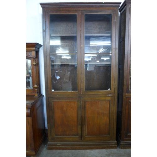 111 - A large early 20th Century mahogany bookcase, 250cms h, 127cms w, 28cms d