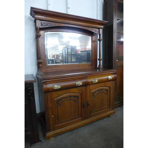 112 - An Edward VII walnut mirrorback sideboard