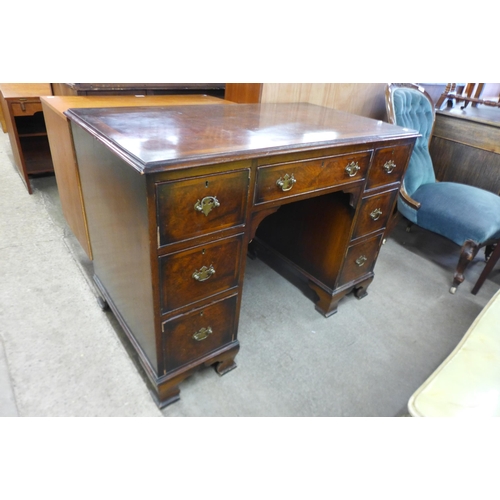 130 - A George III style burr walnut desk