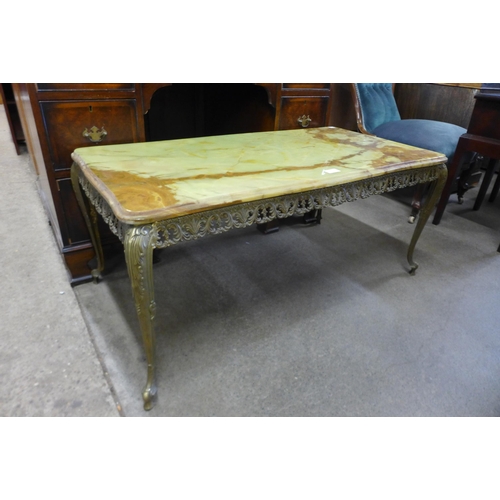 131 - An Italian style onyx and brass coffee table