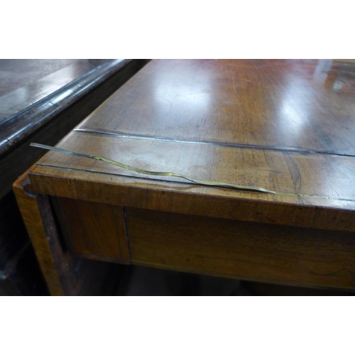 139 - A Regency rosewood and brass inlaid sofa table