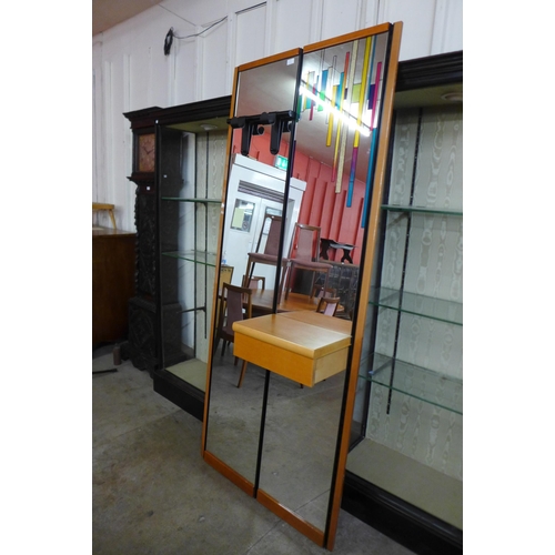 177 - A large contemporary Italian mirror with coat hooks