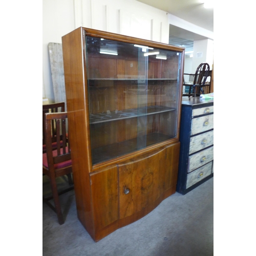 181 - An Art Deco walnut bookcase