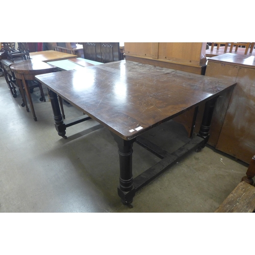 224 - A Victorian painted beech kitchen table with an elm top