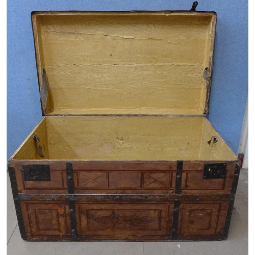 252 - A metal banded steamer trunk