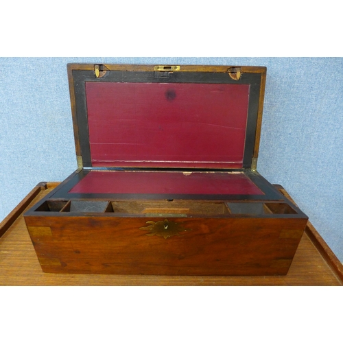 301 - A Victorian walnut and brass mounted writing slope