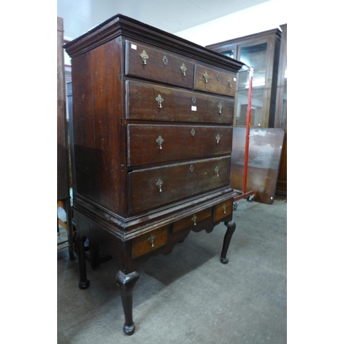 31 - A George II oak chest on stand