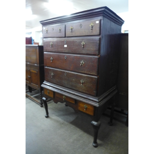 31 - A George II oak chest on stand