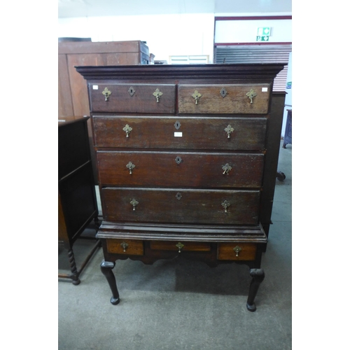 31 - A George II oak chest on stand