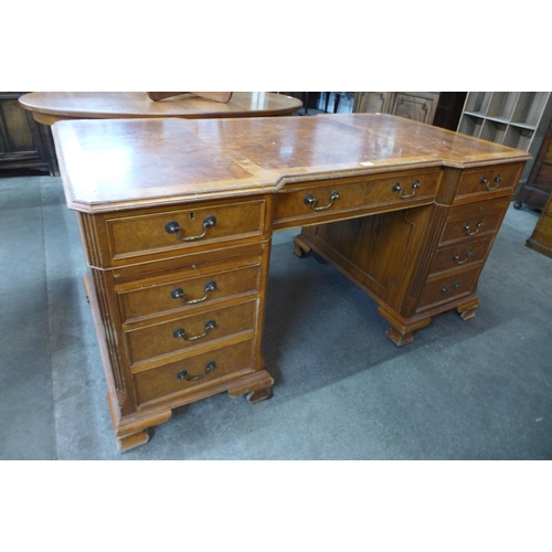 32 - A George III style elm and walnut library desk