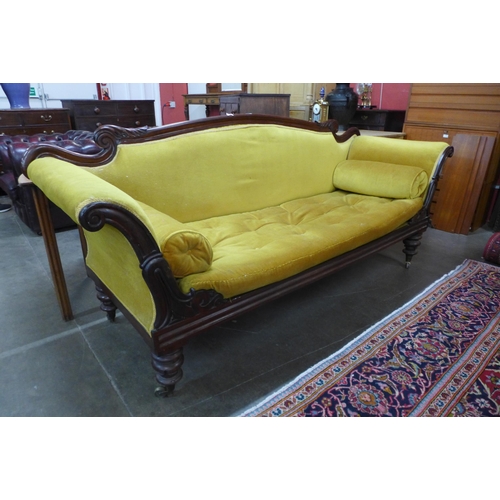 33 - A Regency rosewood and yellow fabric upholstered scroll arm settee