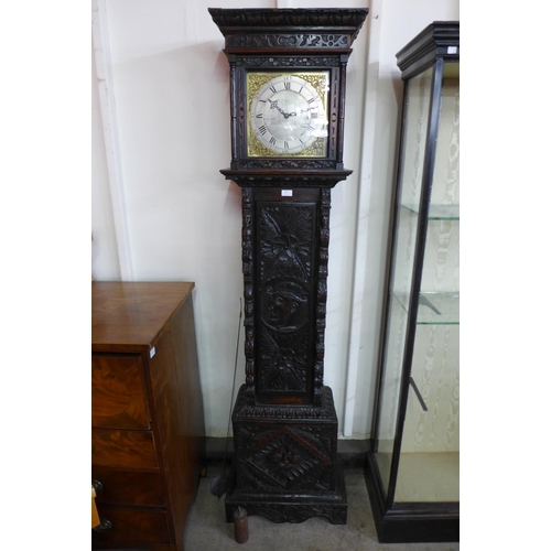 40 - A 17th Century style carved oak 30 hour longcase clock, the silvered dial signed Oatway, Orrington