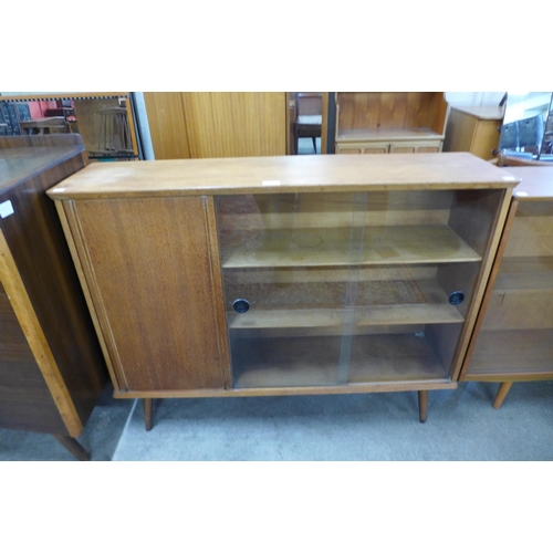 46 - A light oak bookcase