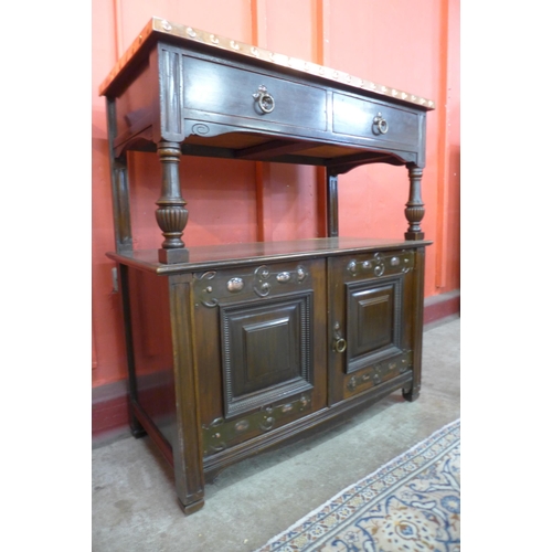 5 - An Arts and Crafts mahogany and copper two tier buffet sideboard, attributed to Shapland & Petter of... 