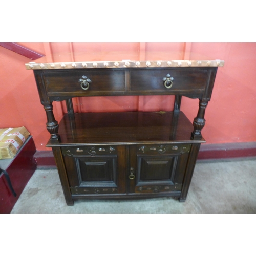 5 - An Arts and Crafts mahogany and copper two tier buffet sideboard, attributed to Shapland & Petter of... 