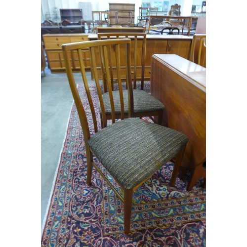 51 - A McIntosh teak drop leaf table and four chairs