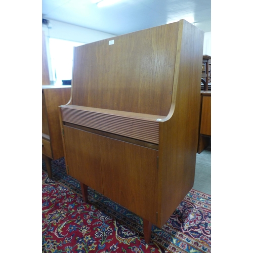 57 - An Elliotts of Newbury teak bureau