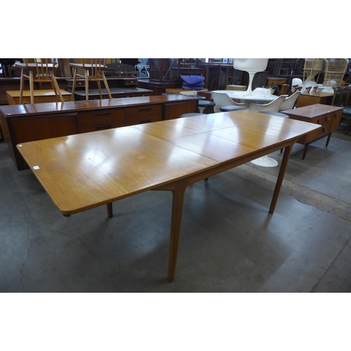 63 - A McIntosh teak T3 extending dining table