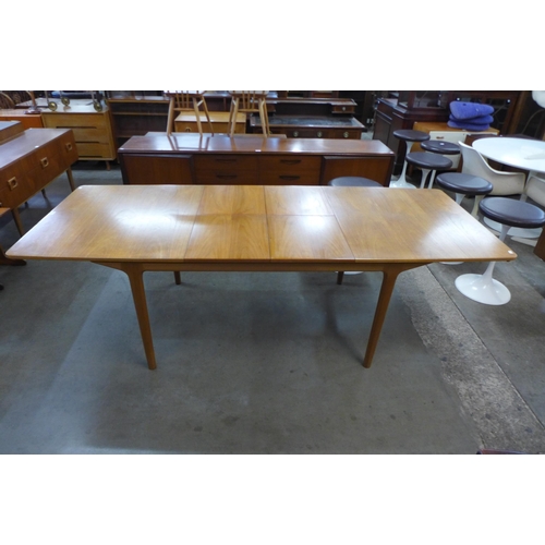 63 - A McIntosh teak T3 extending dining table