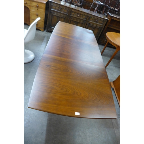 68 - A Vanson mahogany extending dining table