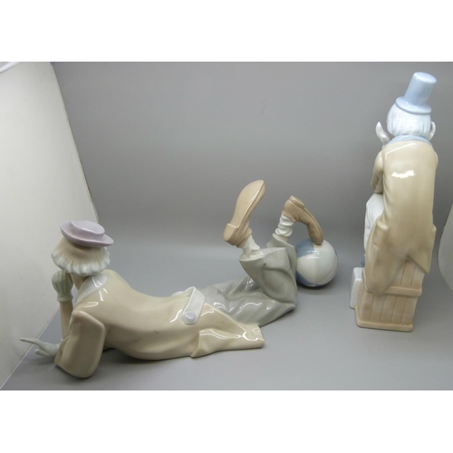 613 - A Lladro figure of a clown lying down and a Casades figure of a seated clown, (2)