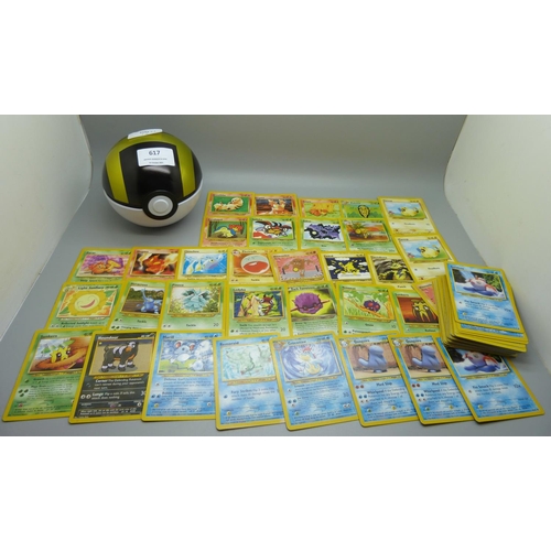 617 - Eighty 1995-2000 Pokemon cards, in Pokeball tin