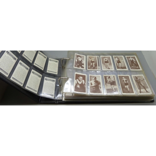 618 - Cigarette cards; an album of cigarette cards containing 10 complete sets including Churchman’s Boxin... 