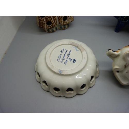 625 - A Russian figure of a tiger cub, a Delft pierced dish, a studio pottery owl tea light holder and a w... 