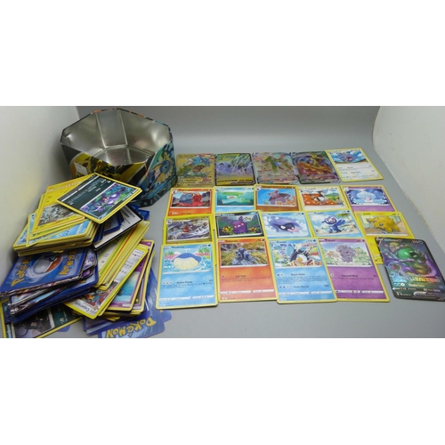 626 - A large collection of Pokemon cards including one metal Gyarados