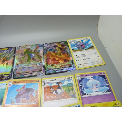 626 - A large collection of Pokemon cards including one metal Gyarados