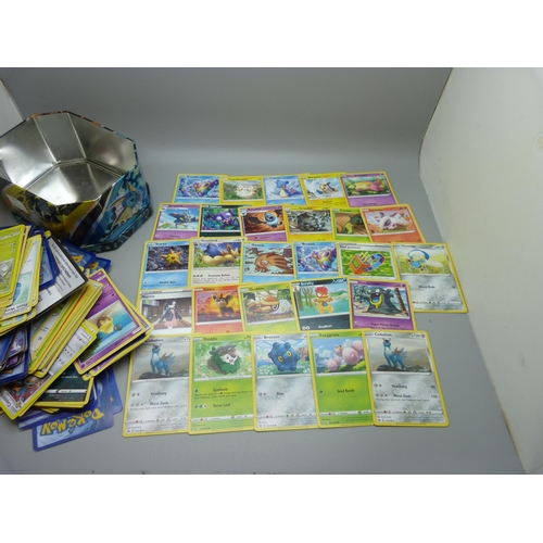 626 - A large collection of Pokemon cards including one metal Gyarados