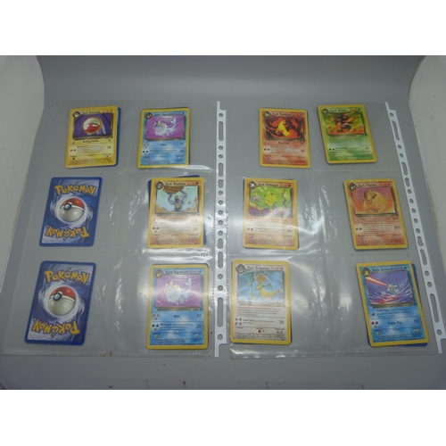 639 - Eighty Pokemon Team Rocket sets, including holographic Dark Alacazam