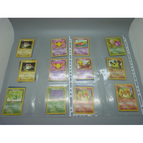 639 - Eighty Pokemon Team Rocket sets, including holographic Dark Alacazam