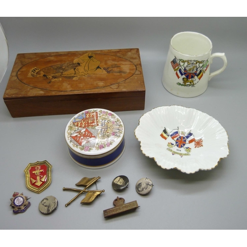 654 - Sutherland china 1914 commemorative dish, a similar mug, a pot, a collection of badges and a wooden ... 