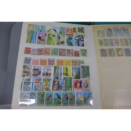 677 - Three stamp albums including Singapore, St. Lucia, Seychelles, British Solomon Islands, Pakistan, Rh... 