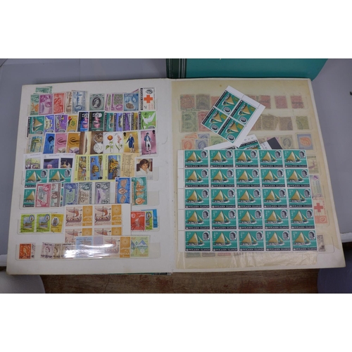 677 - Three stamp albums including Singapore, St. Lucia, Seychelles, British Solomon Islands, Pakistan, Rh... 