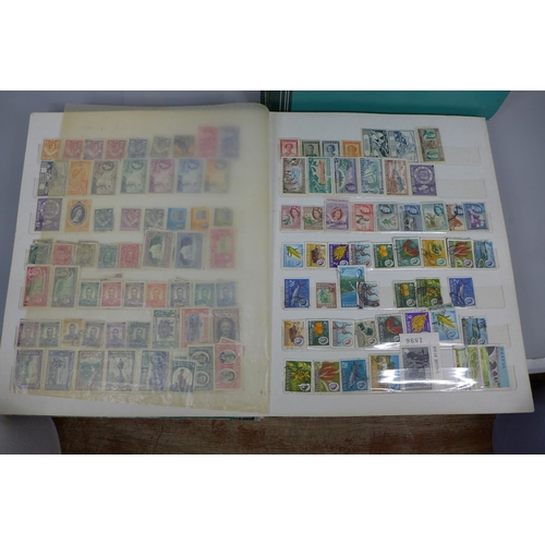 677 - Three stamp albums including Singapore, St. Lucia, Seychelles, British Solomon Islands, Pakistan, Rh... 