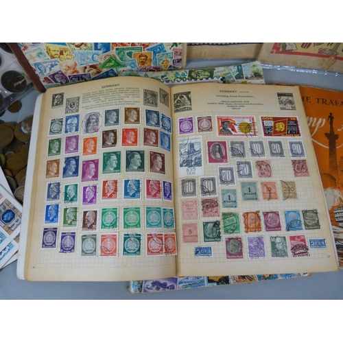 680 - Four stamp albums, a folder of coins, loose coins and two comics from 1940