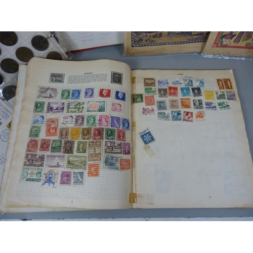 680 - Four stamp albums, a folder of coins, loose coins and two comics from 1940