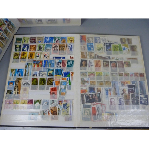 682 - Three stamp albums including South Africa, Egypt, Gambia, Dominica, Tanzania, Tonga, etc.